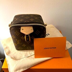 Louis Vuitton just in case bag. New never used.